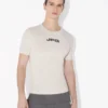 Camiseta Baby Tee JPG en color crudo Camiseta Baby Tee JPG en color crudo