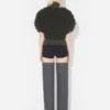 El jerseis sin mangas con punto de bucle El jerseis sin mangas con punto de bucle