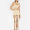 Los pantalones cortos beige con parche Gaultier Los pantalones cortos beige con parche Gaultier
