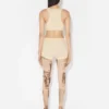 Los pantalones cortos beige con parche Gaultier Los pantalones cortos beige con parche Gaultier