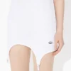 El vestido blanco con liguero El vestido blanco con liguero
