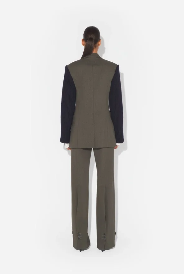 La chaqueta de traje bimaterial La chaqueta de traje bimaterial