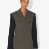 La chaqueta de traje bimaterial La chaqueta de traje bimaterial