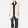 La chaqueta de traje sin mangas color vainilla La chaqueta de traje sin mangas color vainilla