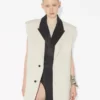 La chaqueta de traje sin mangas color vainilla La chaqueta de traje sin mangas color vainilla