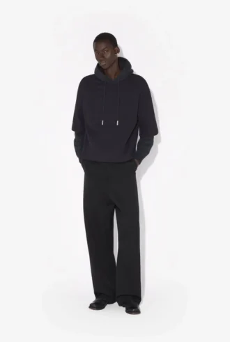 La sudadera negra oversize de JPG