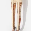 Los pantalones cortos beige con parche Gaultier Los pantalones cortos beige con parche Gaultier