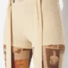 Los pantalones cortos beige con parche Gaultier Los pantalones cortos beige con parche Gaultier