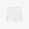 Los pantalones cortos blancos con liguero Los pantalones cortos blancos con liguero