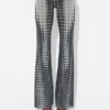 Reedición: pantalones con lunares blancos y negros Reedición: pantalones con lunares blancos y negros
